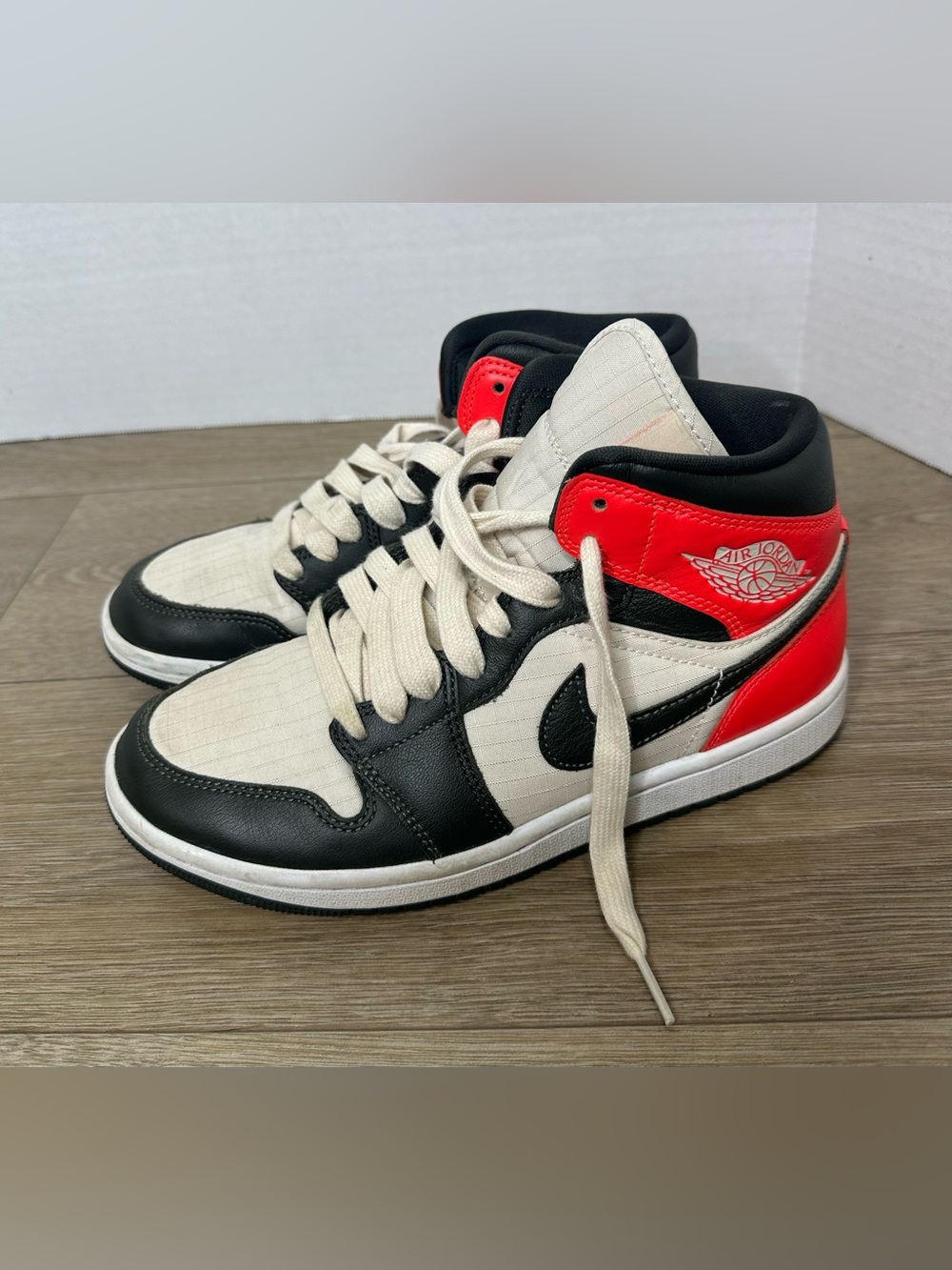 Jordan Mid-Top Sneakers in Black, White & Red
